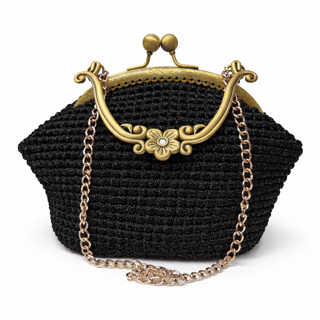 Bolso negro con cierre floral vintage